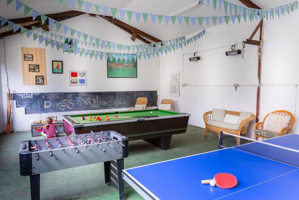Games room in winter at Cae Madog Barn